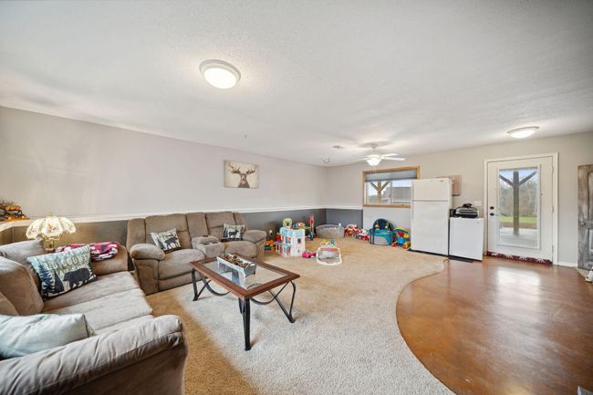 Another view of lower level., and access to the new concrete patio! | Image 23