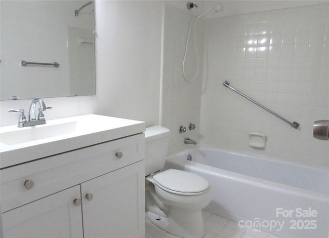 Bathroom has new vanity & faucets | Image 19