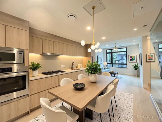 Dining room with recessed lighting, light wood-style floors, baseboards, and an inviting chandelier | Image 23