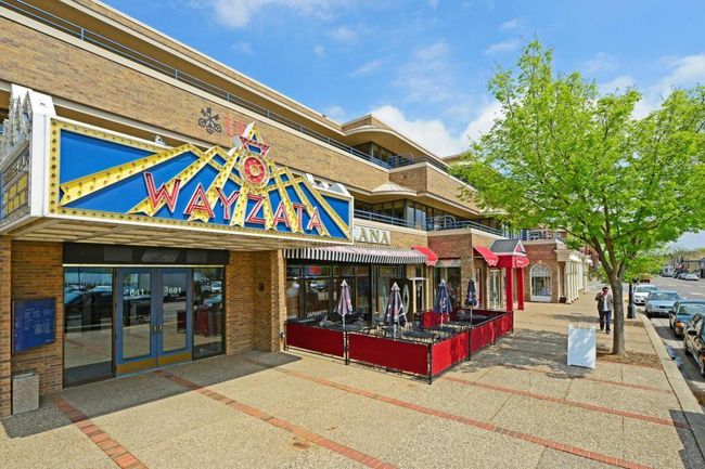 Home is located just a short walk or drive to the charming lake side village of Wayzata | Image 38