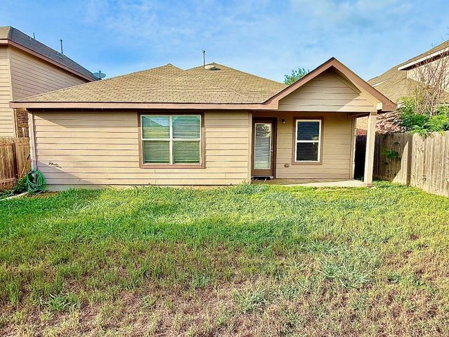Back of house with a shingled roof | Image 20
