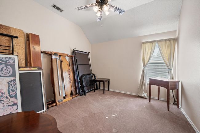 This space is adjacent to the primary suite and would be a great space for a home gym, second office or a nursery! | Image 34