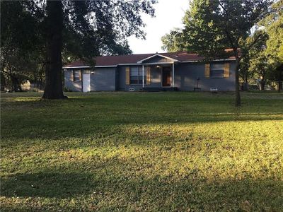 Ranch-style home featuring a front lawn | Image 1