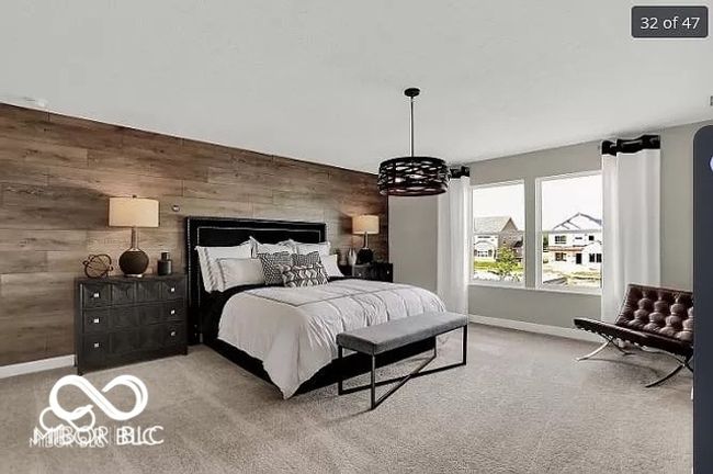 Primary bedroom upstairs with baseboards and carpeted floors | Image 14