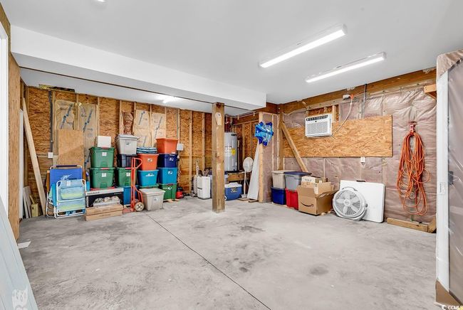 Garage featuring water heater | Image 27