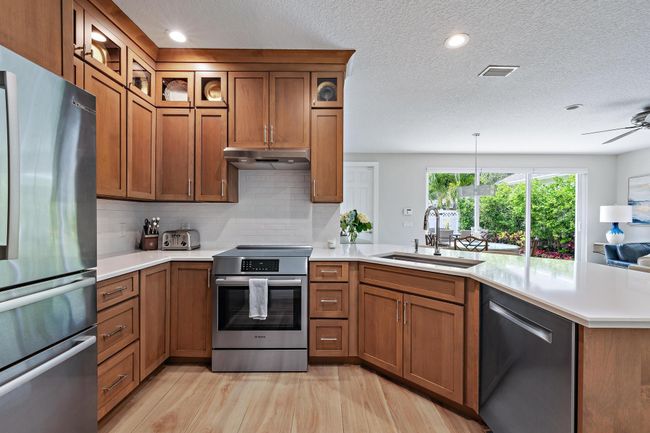 138 Poinciana Dr, House other with 3 bedrooms, 3 bathrooms and null parking in Jupiter FL | Image 5