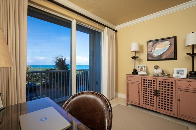 Flex room with ocean views. This room now has bedroom furniture in it which conveys. | Image 10