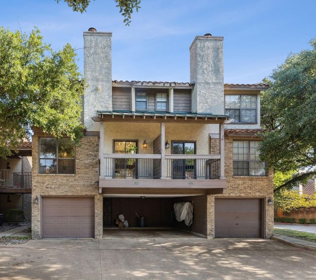 View of garage and balcony. Unit 8D is on the right of this photo. | Image 17