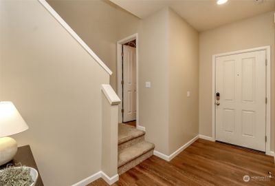 Entry way with half bath | Image 3