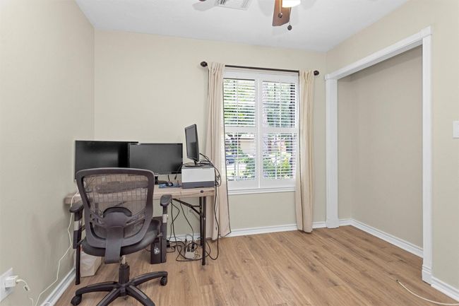Originally a 4th bedroom, this room was converted into a dedicated office. It could be reverted back to a 4th bedroom by new owners if desired. | Image 13