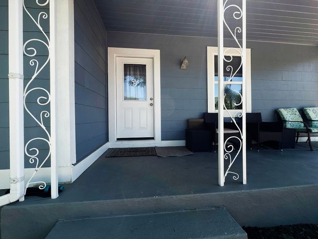 Entrance to property with covered porch | Image 12