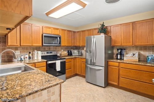 15437 Crystal Lake Dr, NORTH FORT MYERS, FL, 33917-5626 | Card Image