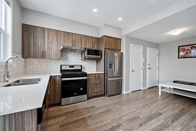 202 - 215 Redstone Ne, Home with 2 bedrooms, 2 bathrooms and 1 parking in Calgary AB | Image 5