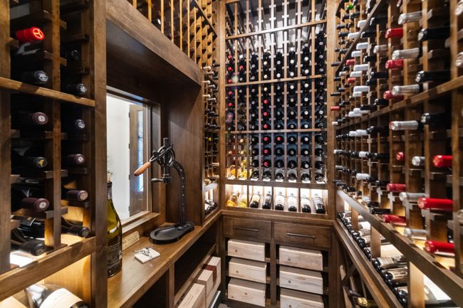 View of very upscale wine room - an entertainer's delight | Image 27