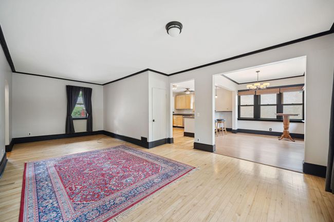 Large living room is open to dining room and kitchen | Image 6