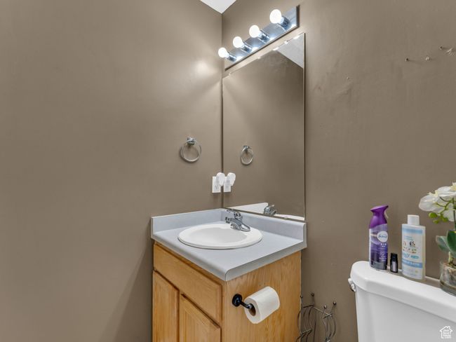 Bathroom with toilet and vanity | Image 30