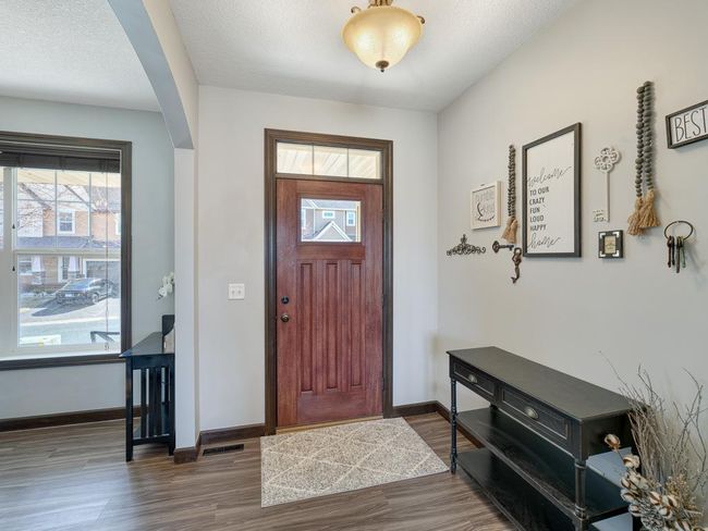 There is an office space immediately when you walk int the front door. | Image 11