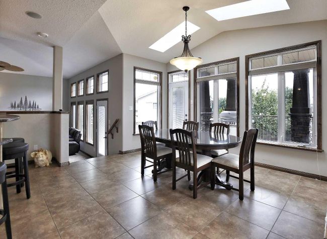 101 Grizzly Terrace N, Home with 5 bedrooms, 3 bathrooms and 4 parking in Lethbridge AB | Image 7