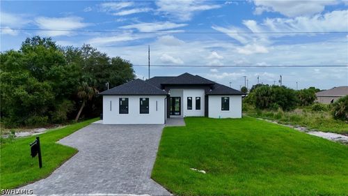 830 Wolverine St E, LEHIGH ACRES, FL, 33974-0715 | Card Image