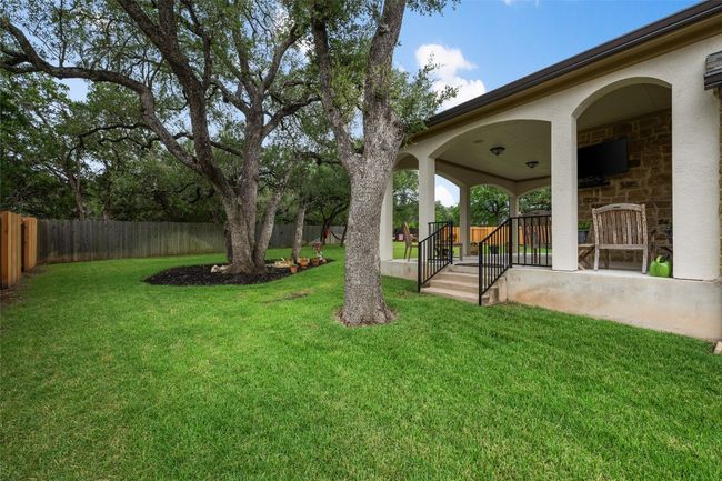 View of fenced backyard | Image 33