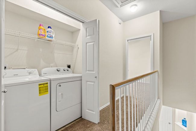 Situated upstairs between the two Primary Bedrooms | Image 21