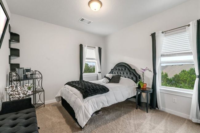 Bedroom featuring carpet flooring and baseboards | Image 33