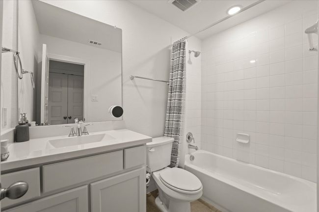 Full bathroom with vanity and shower / bathtub combination with curtain | Image 20