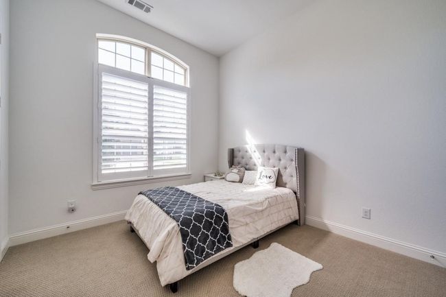 Bedroom featuring carpet and baseboards | Image 29