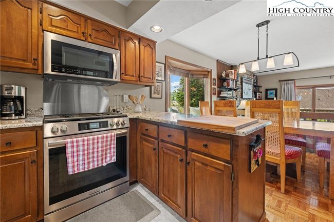 Dining is adjacent to kitchen | Image 13