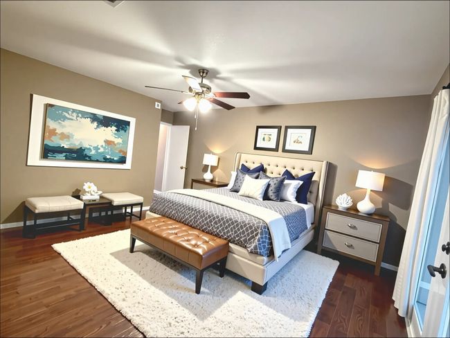 Primary bedroom virtually staged. Room is nicely sized for a king bed and furnishings | Image 17