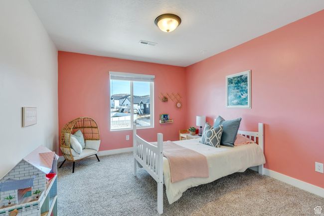 Carpeted bedroom with baseboards and visible vents | Image 15