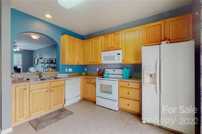 Spacious kitchen with tons of cabinets, and all appliances included | Image 9