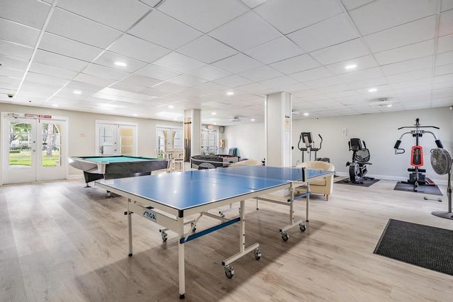 Remodeled Fitness & Game Room | Image 25