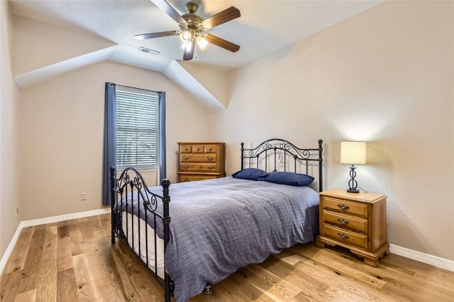 Large Secondary bedroom with interesting architectural elements | Image 19