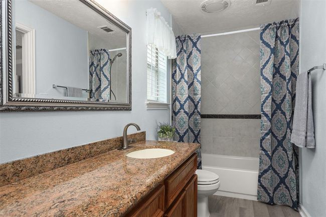 Primary Bath with Plenty of Counter Space and a Walk-In Closet | Image 9