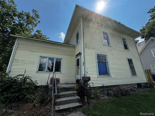 411 W Ash St, Mason, MI, 48854-1551 | Card Image