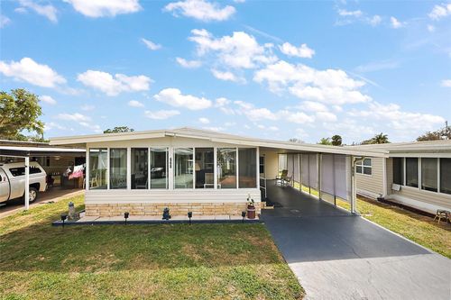 668 Lori Dr, LEESBURG, FL, 34788-2445 | Card Image