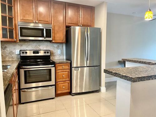 j12-809 W Oakland Park Blvd, Wilton Manors, FL, 33311-1778 | Card Image