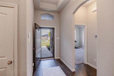 Foyer entrance with dark hardwood / wood-style floors | Image 3