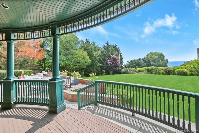 VERANDA VIEW // Enjoy the brilliant views from the veranda which runs across the entirety of the back of the home. | Image 30