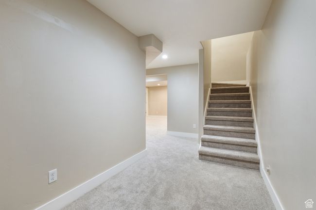 Staircase featuring carpet flooring and recessed lighting | Image 24