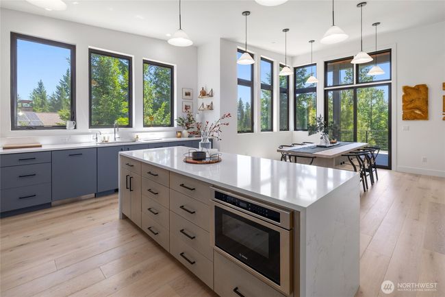 Generous island in kitchen. | Image 11