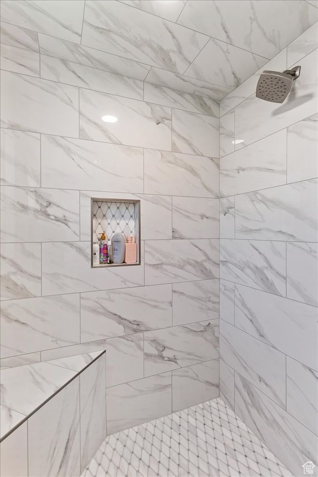 Bathroom with a tile shower | Image 26