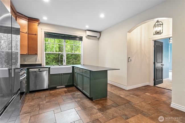Entering the secondary living space from inside the house. Can also be accessed from a private entrance on the right side of the house. | Image 25