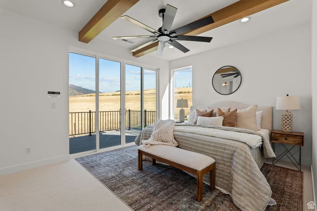 Bedroom with beam ceiling, carpet, recessed lighting, access to exterior, and a ceiling fan | Image 40
