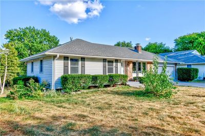 Ranch-style house featuring a front lawn | Image 3