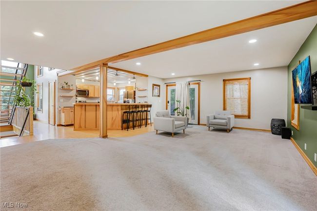 Living room featuring recessed lighting, stairs, and light colored carpet | Image 10
