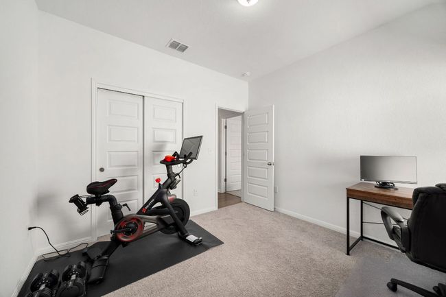 Workout area with carpet and baseboards | Image 29