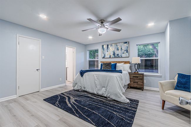 Bedroom featuring recessed lighting, baseboards, ceiling fan, and light wood finished floors | Image 11