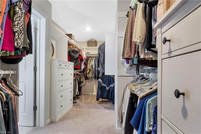 Giant main closet has amazing custom cabinet build | Image 25